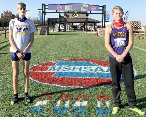 TROJANS AT STATE – Freshman Zeke Sisk, at left, and Senior Will Jarvis, at right, pose for a photo at the State Cross Country Meet on Thursday, Nov. 5th in Columbia.(Submitted Photo)