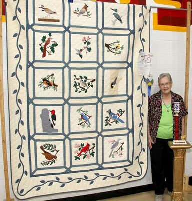 The winner of the 2021 Caledonia Quilt Show ‘Best of Show’ was Mayno Woods with her beautiful ‘Birds’ quilt. The Quilt Show was held on Saturday, June 12th, 2021 at the Valley High School gymnasium. The show attracted a large crowd during the day and had a large number of quilts that featured several styles, colors, and patterns. The ‘Best of Show’ was voted on by the public that attended. Mayno said she still loves to quilt and the quilt here was done in 1990. The Quilt Show also featured the 2021 Missouri Bicentennial Quilt, on loan from the State of Missouri.