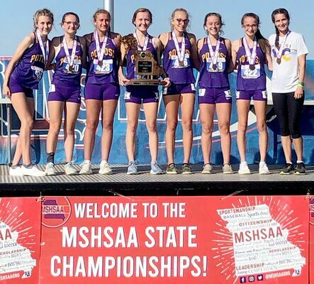 CLINCHED 3RD IN STATE! – The Lady Trojan Cross Country runners captured a place on the podium and hoisted the 2020 trophy for 3rd Place in State Class 3 competition on Thursday, Nov. 5th in Columbia. The team ran well in some very warm temperatures and serious competition. From left, representing the Trojans are Alyson Skiles, Carlee Moss, Gracie Shutz, Hallie Portell, Kaydence Gibson, Emily Hochstatter, Celeste Sansegraw and Coach Amanda Politte. Sophomore Celeste Sansegraw got All State honors with a 21st Place finish in the Class 3 competition. There were 16 teams represented at the State Meet.          (Submitted Photo)
