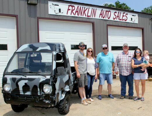 The Franklins gathered for a photo with Washington County Fair President Randy Fryman last week as they donated a ‘unique’ work truck for the Potosi Lions Fairgrounds