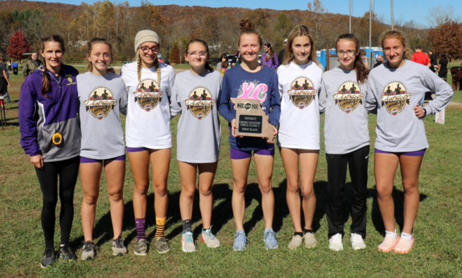 LADY TROJAN CROSS COUNTRY CLASS 3 DISTRICT CHAMPS – The Potosi High School Varsity Cross Country Ladies ran in District competition on Saturday, Oct. 31st, 2020. The Trojans came away with a very good showing winning the team championship for Potosi High. From left with the District Championship plaque are Coach Amanda Politte, Emily Hochstatter 21st, Kaydence Gibson 16th, Carlee Moss 9th, Hallie Portell 24th, Alyson Skiles 7th, Celeste Sansegraw 2nd and Gracie Shutz 6th. The State High School Cross Country is set for this Thursday, Nov. 5th at Gans Creek in Columbia.			      (Sub. Photo)