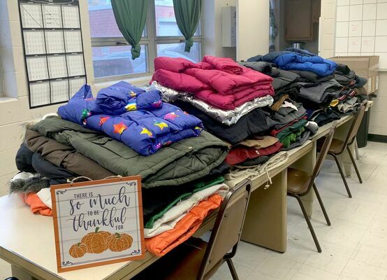 SPREADING HOLIDAY CHEER – Doe Run employees collected 90 coats for the mission in Bunker and provided holiday gifts for local families through the Bunker R-3 School District.	          (Submitted Photo)