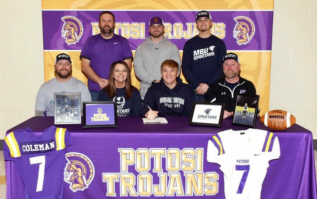 Joining Blake, from left are Step-Dad & Mom, Andy & Nickie Thornton, and Dad, Jason Coleman at right; standing, from left are P.H.S. Athletic Director Steven ‘Bubba’ McCoy, Head Football Coach Dylan Wyrick and Blake’s brother, also a former Trojan quarterback, Andrew Coleman.